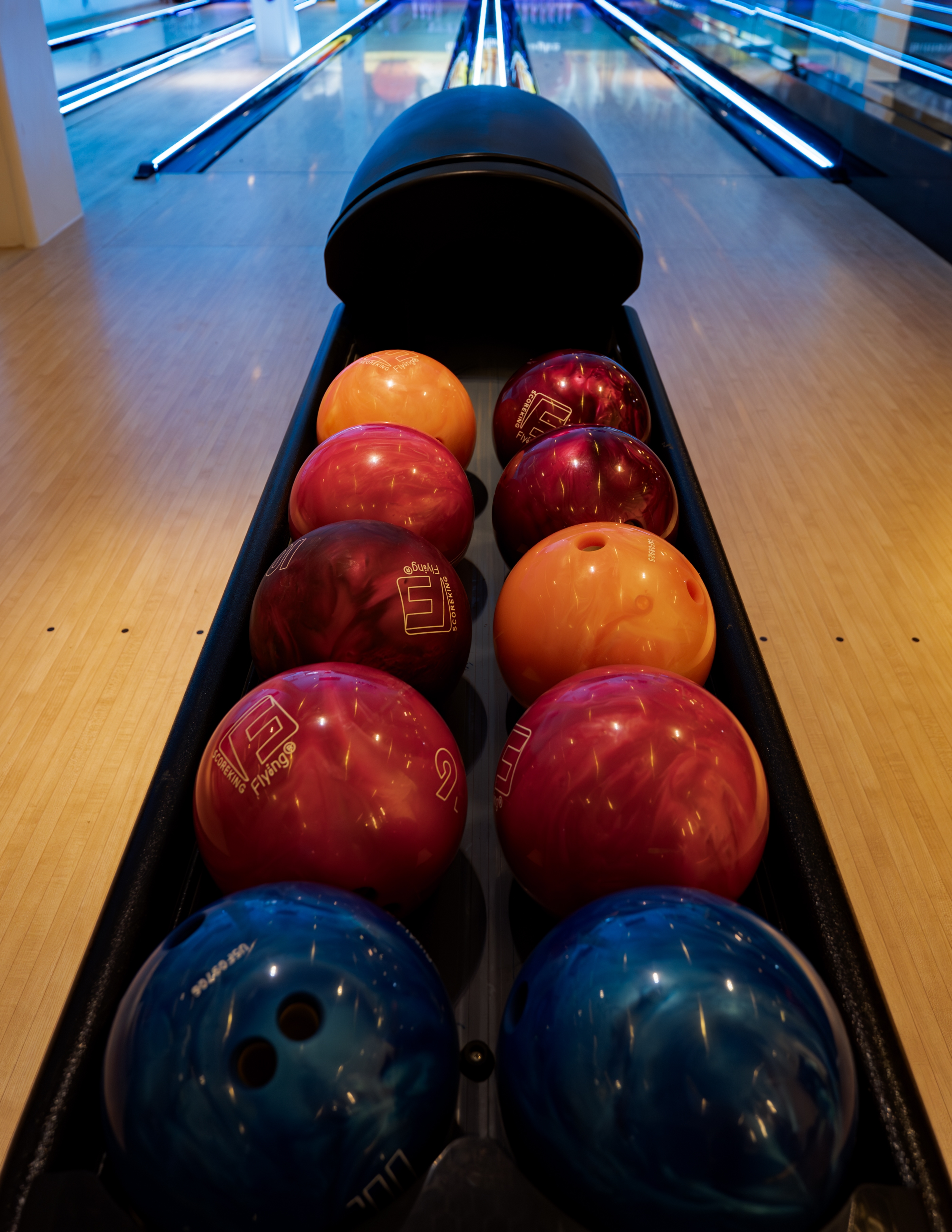 House bowling balls racked and ready