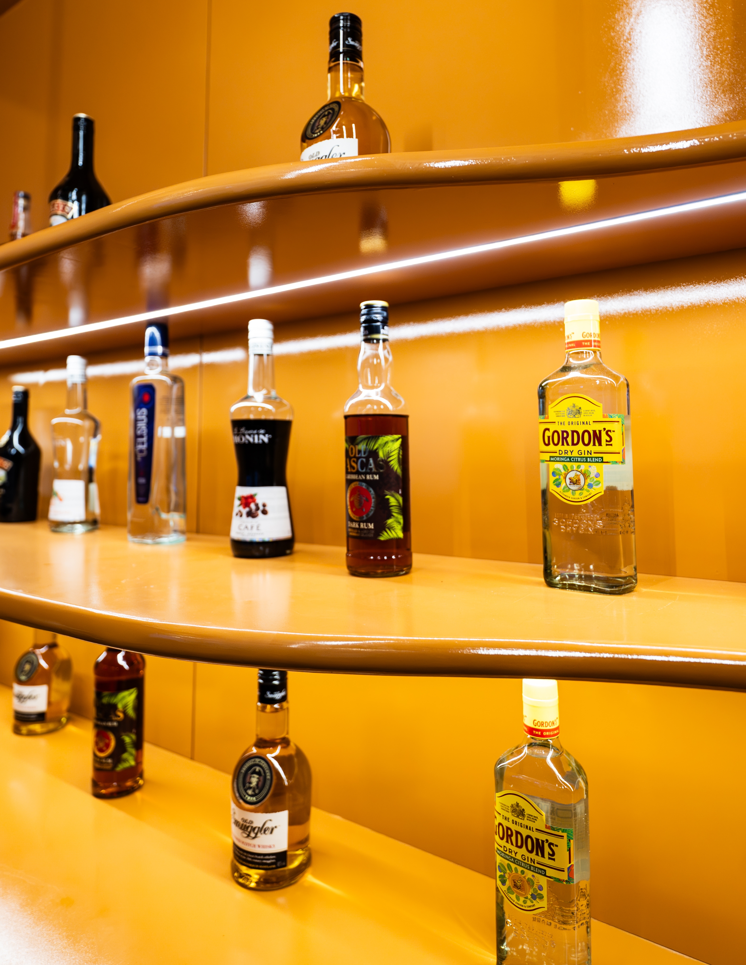 Backlit bar shelf with spirits